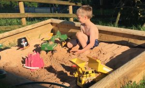 child in sandpit